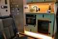 Interior kitchen view of camper van Grit Overland