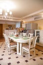 The interior of the kitchen. white table and chairs