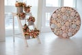 Interior with ladder and Bouquets peonies in round boxes. Wedding ceremony decor. Colorful balls. Decorative Pink and blue bubbles