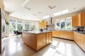 The interior of a large modern bright kitchen with a high ceiling and panoramic windows Royalty Free Stock Photo