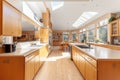The interior of a large modern bright kitchen with a high ceiling and panoramic windows Royalty Free Stock Photo