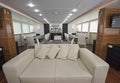 Interior of large salon area of luxury motor yacht Royalty Free Stock Photo