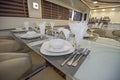 Interior of large salon dining area of luxury motor yacht Royalty Free Stock Photo