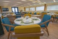 Interior of large salon dining area of luxury motor yacht Royalty Free Stock Photo