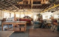 Interior of a large woodworking studio full of machinery