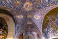 The interior of the Latin Calvary Chapel in the Church of the Holy Sepulchre, decorated with the colorful mosaic patterns and