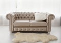 Interior, leather sofa in white room Royalty Free Stock Photo