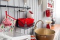 Shelves with dishes. Interior light grey kitchen and red christmas decor. Preparing lunch at home on the kitchen concept Royalty Free Stock Photo