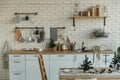 Interior light kitchen with christmas decor and tree Royalty Free Stock Photo