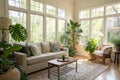 Interior of light living room with green plants and sofa Royalty Free Stock Photo