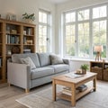 Interior of light living room with grey sofa, table and shelving units Royalty Free Stock Photo
