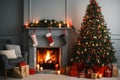 Interior of living room with fireplace, presents and Christmas tree Royalty Free Stock Photo