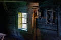 Interior of living room in old traditional rural wooden house. Royalty Free Stock Photo