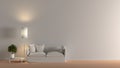 Interior of living room with white fabric sofa, floor lamp and lemon tree in vase on wooden coffee table