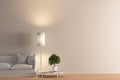 Interior of living room with white fabric sofa, floor lamp and lemon tree in vase on wooden coffee table