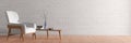 Interior of living room with white leather armchair and wooden triangular coffee table