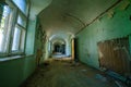 Long hallway with crumbing walls Royalty Free Stock Photo