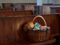 Interior of Lutheran church in Finnish Tuusula town: basket with children\'s toys on bench.