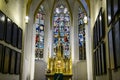 Altar and stained glass window of Lutheran St. Thomas Church Thomaskirche Interior in Leipzig, Germany. November 2019 Royalty Free Stock Photo