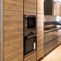 Interior of luxurious modern kitchen and oak grey cabinets Royalty Free Stock Photo