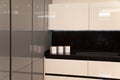 Interior of luxurious modern kitchen white grey cabinets Royalty Free Stock Photo
