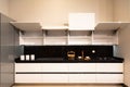 Interior of luxurious modern kitchen white grey cabinets Royalty Free Stock Photo