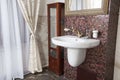 Interior of luxury bathroom in classical style.