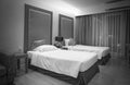 Interior of luxury double beds in hotel bedroom on Mittraphap Road, Nakhon Ratchasima Royalty Free Stock Photo