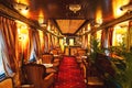 Interior of luxury vintage old train carriage. Retro train from the early 20th century Royalty Free Stock Photo