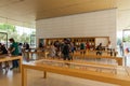 Interior with many customers in the new Apple store