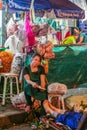 Interior of the market of flowers and fruits. Professions of local people.