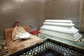 Interior of the Mausoleum with a Koran reader