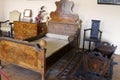 Interior of medieval Cerveny Kamen Red Stown Castle. Bedroom