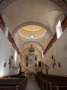 Interior of the Mission Concepcion in San Antonio, Texas, with Blue and Gold Reredos Behind the Altar and Painted Ceiling Above Royalty Free Stock Photo