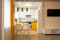 interior of a modern apartment. kitchen in shades of yellow Royalty Free Stock Photo