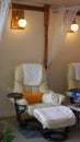 Interior of modern Asian style spa salon: foot massage or pedicure chair