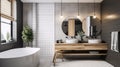 Interior of modern bathroom with gray tile walls, wooden floor, white bathtub, round mirror and sink. Scandinavian style Royalty Free Stock Photo