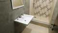 Interior of a modern, beautiful, small bathroom in beige tones. Picture of shower cubicle in modern toilet, small