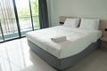 Interior modern  bedroom white bed in the hotel Royalty Free Stock Photo