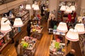 Interior of a modern bookshop with people from above browsing the collection. Royalty Free Stock Photo