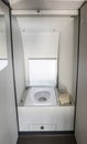 Interior of a modern business turboprop aircraft. Toilet in a small business jet