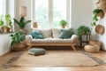 Interior of modern cozy living room in Scandi style. Stylish sofa with pillows, braided rug on the floor, wicker Royalty Free Stock Photo