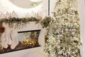 Interior with modern decorated Christmas fireplace Royalty Free Stock Photo