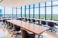 The interior of a modern empty office building with tables and chairs. Floor-to-ceiling windows Royalty Free Stock Photo