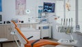 Interior of modern equipped dental orthodontic office with teeth x ray images