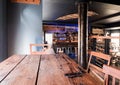 Interior of modern european beer bar pub with old vintage wooden furniture and style. Royalty Free Stock Photo