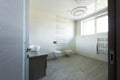 interior of modern grey bathroom with toilet and bidet view Royalty Free Stock Photo