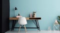 Interior of modern home office with wooden desk, chair and plant, blue walls. Minimalistic style.