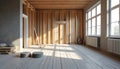 Interior of modern home under construction. Wooden studs frame walls, unfinished room needs work. Bright sunlight streams through Royalty Free Stock Photo