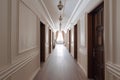 Interior of a modern hotel white corridor. Colonial, country style Royalty Free Stock Photo